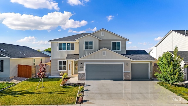 view of front of home featuring an attached garage, concrete driveway, board and batten siding, and roof with shingles