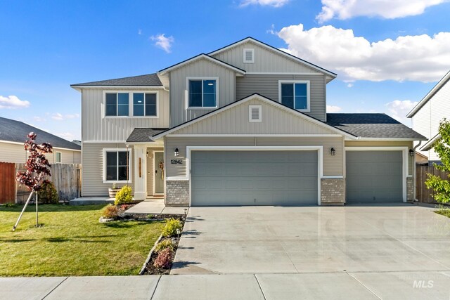 craftsman house featuring driveway, an attached garage, roof with shingles, brick siding, and board and batten siding