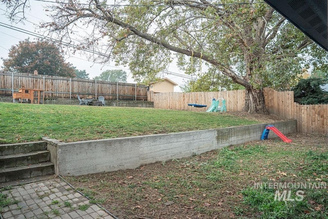 view of yard with a fenced backyard