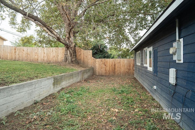 view of yard with a fenced backyard