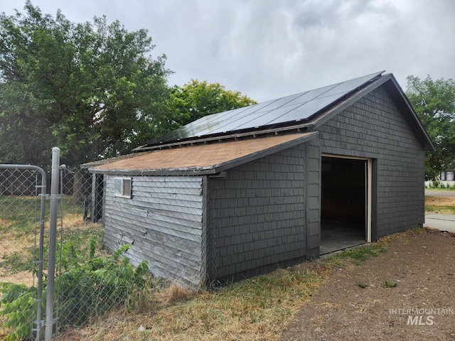 82 NW 3rd St, Ontario, OR 97914 - garage featuring solar panels
