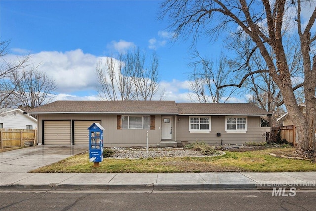 1540 Richmond Dr, Twin Falls, ID 83301 - ranch-style house with concrete driveway, a garage, and fence