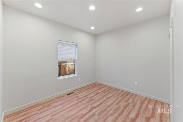 empty room featuring light hardwood / wood-style flooring