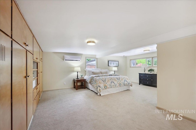 bedroom with light colored carpet, multiple windows, and a wall unit AC