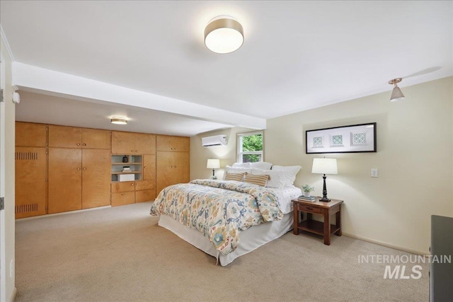 bedroom featuring light carpet, an AC wall unit, and baseboards