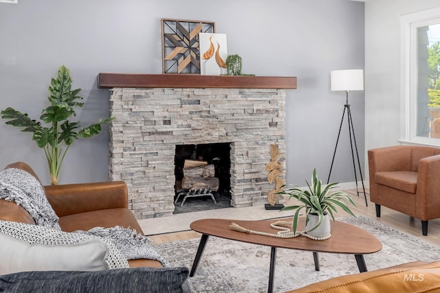 3716 W Palouse St, Boise, ID 83705 - living area with wood finished floors, a fireplace, and baseboards