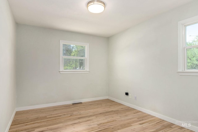 3716 W Palouse St, Boise, ID 83705 - spare room with light wood-type flooring and baseboards