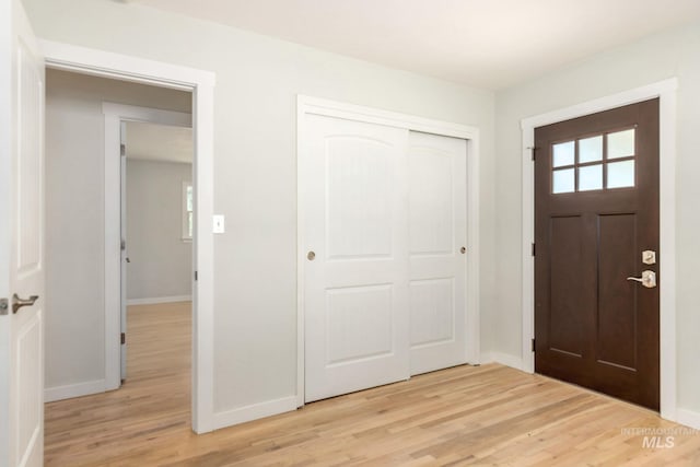 3716 W Palouse St, Boise, ID 83705 - foyer entrance with baseboards and light wood-type flooring