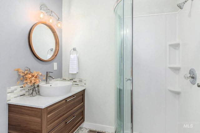 3716 W Palouse St, Boise, ID 83705 - bathroom featuring a stall shower, backsplash, and vanity