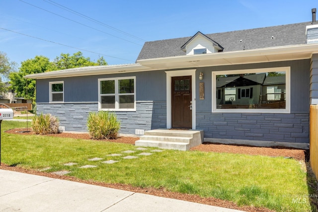 3716 W Palouse St, Boise, ID 83705 - view of front of home featuring stone siding and a front lawn