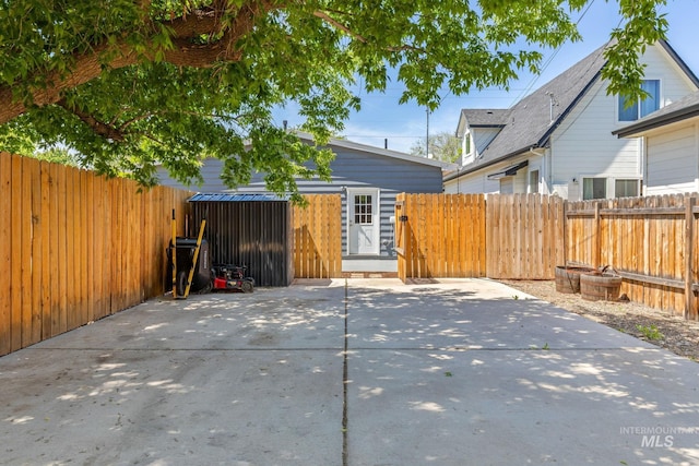 3716 W Palouse St, Boise, ID 83705 - fenced backyard with a patio and an outdoor structure