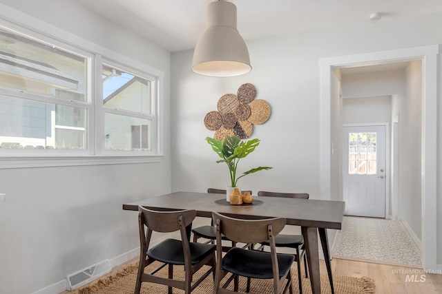 3716 W Palouse St, Boise, ID 83705 - dining space with baseboards and light wood finished floors