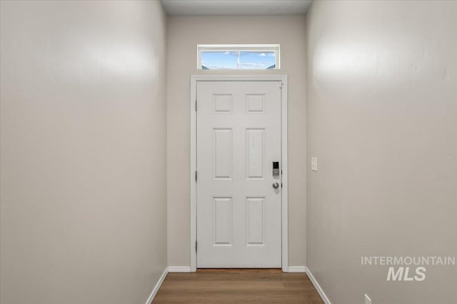 11177 Champlain Pl Unit 9, Caldwell, ID 83605 - doorway featuring wood finished floors and baseboards
