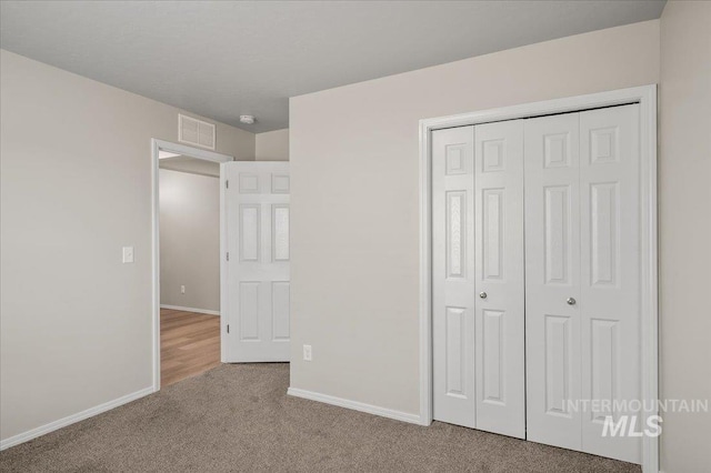 11177 Champlain Pl Unit 9, Caldwell, ID 83605 - unfurnished bedroom featuring carpet floors and a closet