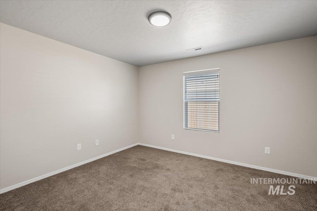 11177 Champlain Pl Unit 9, Caldwell, ID 83605 - unfurnished room with carpet flooring and baseboards