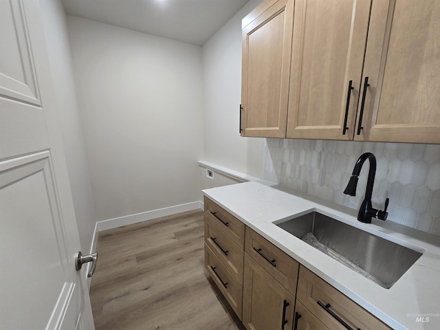 563 Full Moon Way, Twin Falls, ID 83301 - washroom featuring cabinet space and light wood-type flooring
