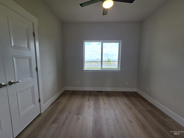 563 Full Moon Way, Twin Falls, ID 83301 - empty room featuring a ceiling fan and wood finished floors