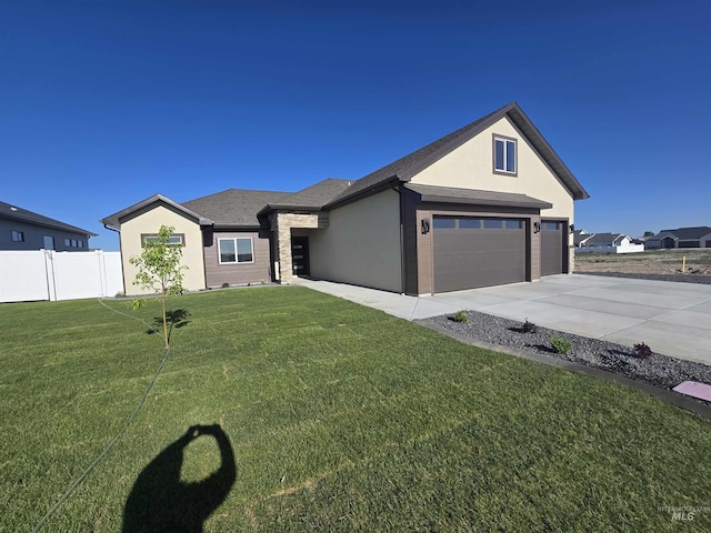 563 Full Moon Way, Twin Falls, ID 83301 - single story home featuring stucco siding, concrete driveway, and an attached garage
