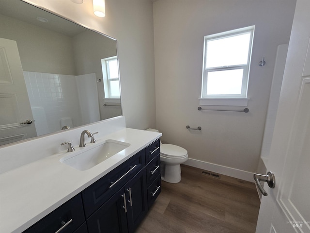 563 Full Moon Way, Twin Falls, ID 83301 - full bath with vanity, a shower, and wood finished floors