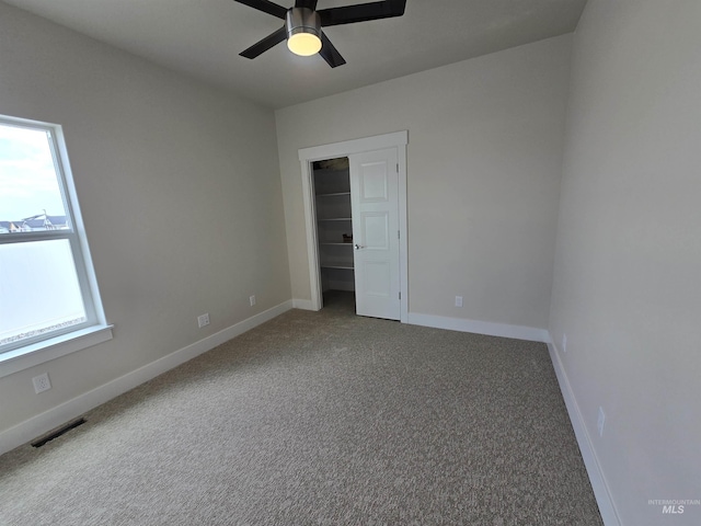 563 Full Moon Way, Twin Falls, ID 83301 - unfurnished bedroom featuring carpet, a closet, and ceiling fan