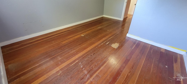 details with wood-type flooring