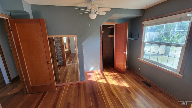 unfurnished bedroom featuring ceiling fan and hardwood / wood-style floors