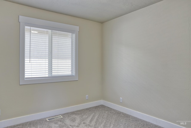 1421 S Denver Ave, Boise, ID 83706 - carpeted empty room with baseboards