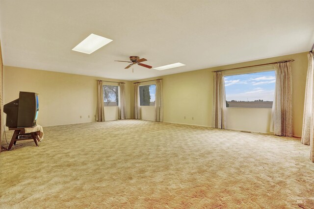 425 W 700 N, Paul, ID 83347 - unfurnished room with a skylight, carpet flooring, and a ceiling fan