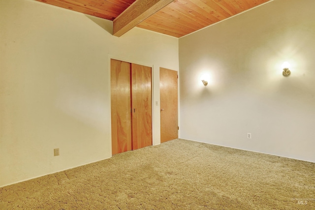 425 W 700 N, Paul, ID 83347 - unfurnished bedroom featuring wooden ceiling, carpet flooring, beam ceiling, and a closet
