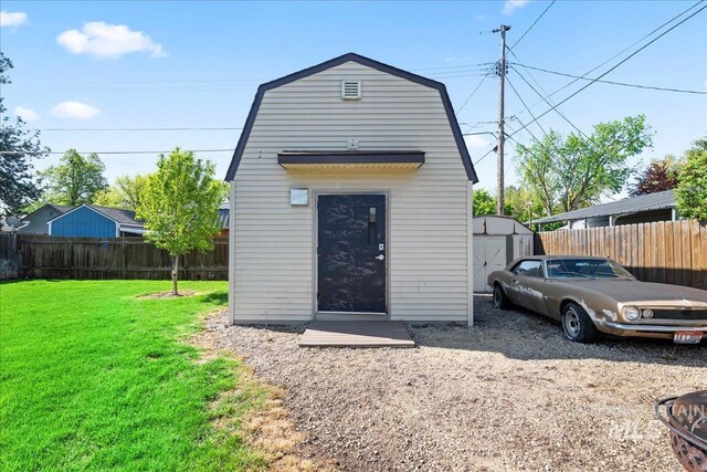 view of shed featuring a fenced backyard