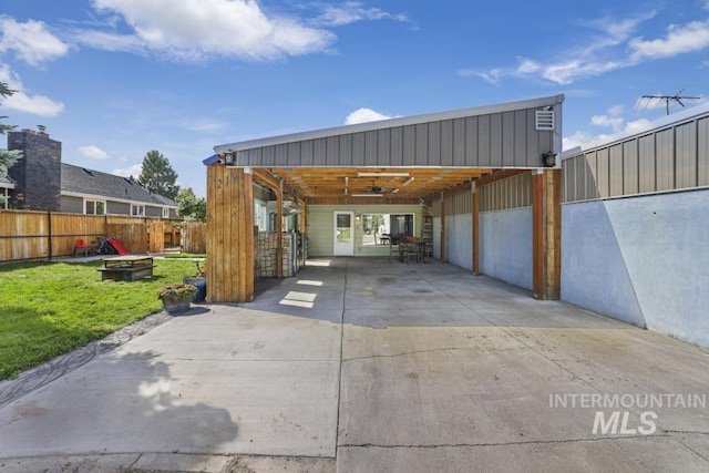 garage with concrete driveway