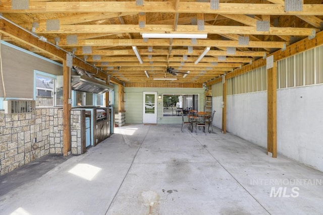 view of patio featuring ceiling fan