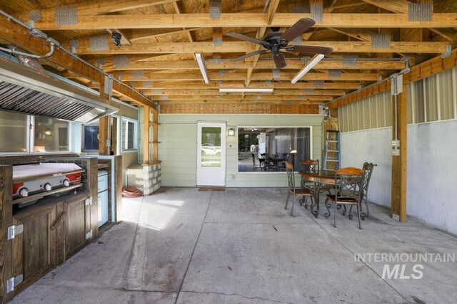 view of patio featuring a ceiling fan and outdoor dining space