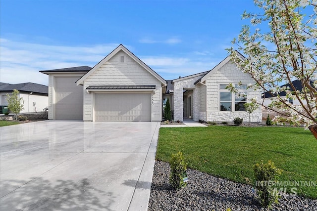 view of front facade with a front lawn, stone siding, driveway, and an attached garage