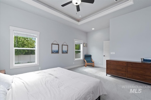 3090 NW 13th St, Meridian, ID 83646 - bedroom with light carpet, baseboards, recessed lighting, a tray ceiling, and a ceiling fan