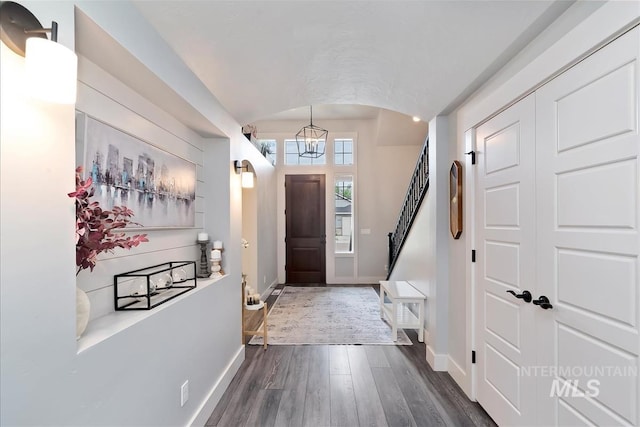 3090 NW 13th St, Meridian, ID 83646 - entrance foyer with baseboards, a chandelier, and dark wood-type flooring
