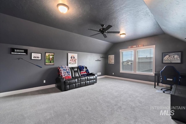 3090 NW 13th St, Meridian, ID 83646 - carpeted home theater room featuring baseboards, a textured ceiling, ceiling fan, and lofted ceiling