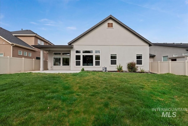 3090 NW 13th St, Meridian, ID 83646 - rear view of house featuring a yard, a patio, and fence