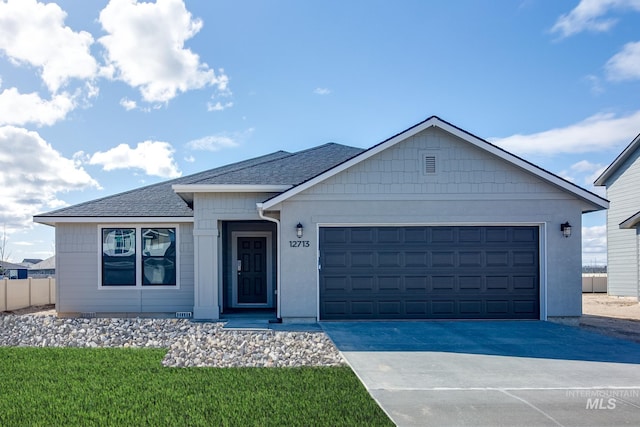 view of front of house with a garage