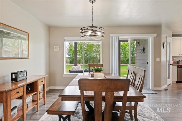 12131 W Precept Ln, Kuna, ID 83634 - dining room featuring wood finished floors and baseboards