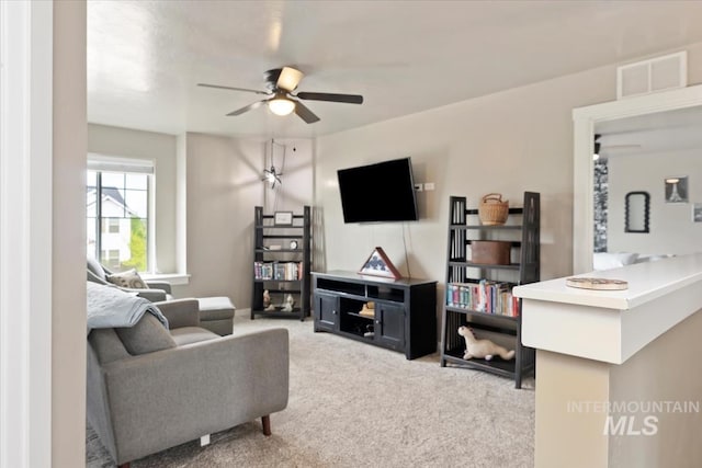 12131 W Precept Ln, Kuna, ID 83634 - living room with ceiling fan and light colored carpet