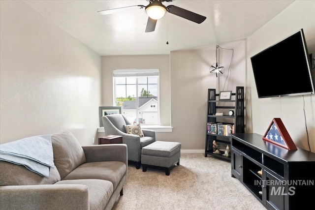 12131 W Precept Ln, Kuna, ID 83634 - sitting room featuring a ceiling fan, light carpet, and baseboards