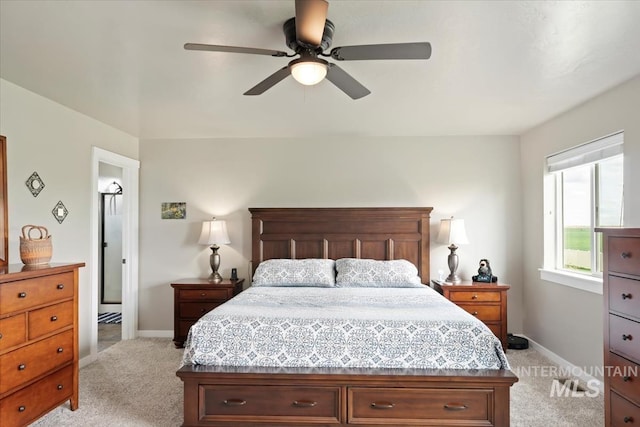 12131 W Precept Ln, Kuna, ID 83634 - bedroom featuring light carpet, baseboards, and a ceiling fan