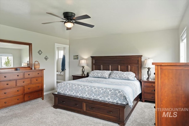 12131 W Precept Ln, Kuna, ID 83634 - bedroom with light colored carpet, baseboards, and ceiling fan