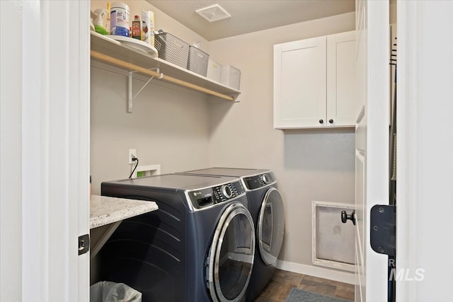 12131 W Precept Ln, Kuna, ID 83634 - clothes washing area with washer and clothes dryer and baseboards