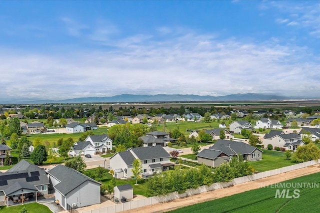 12131 W Precept Ln, Kuna, ID 83634 - aerial view of residential area with a mountain backdrop