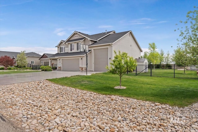 12131 W Precept Ln, Kuna, ID 83634 - view of front of house featuring concrete driveway and an attached garage