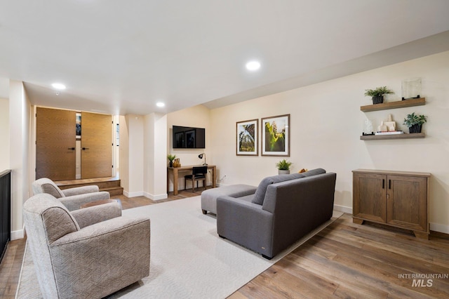 living room with hardwood / wood-style floors