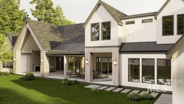 1054 N Delehaye Ave, Eagle, ID 83616 - rear view of house with a standing seam roof, a patio, metal roof, and stone siding