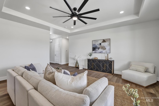 3675 E 3711 N, Kimberly, ID 83341 - living room with a tray ceiling, ceiling fan, recessed lighting, baseboards, and wood finished floors